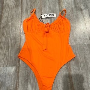 NEON ORANGE BODYSUIT